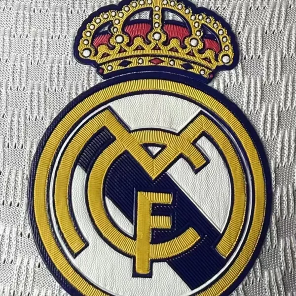 jerseyforge-real-madrid-3d-silicon-crest-detail 2026 Real Madrid Style Home Soccer Jersey - Elite White & Pink Football Shirt - Unbranded High-Performance Teamwear