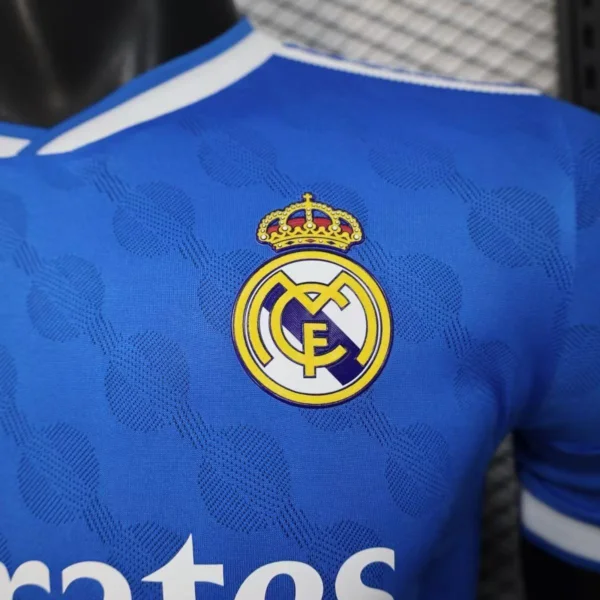 jerseyforge-real-madrid-crest-embroidery-detail 2026 Real Madrid Style Away Soccer Jersey - Elite Royal Blue & White Football Shirt - Unbranded High-Performance Teamwear