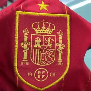 Traditional Spain RFEF national team crest with crown via Custom Soccer Jersey Embroidery.